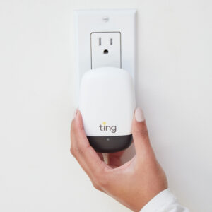 Hand plugging Ting sensor into single outlet